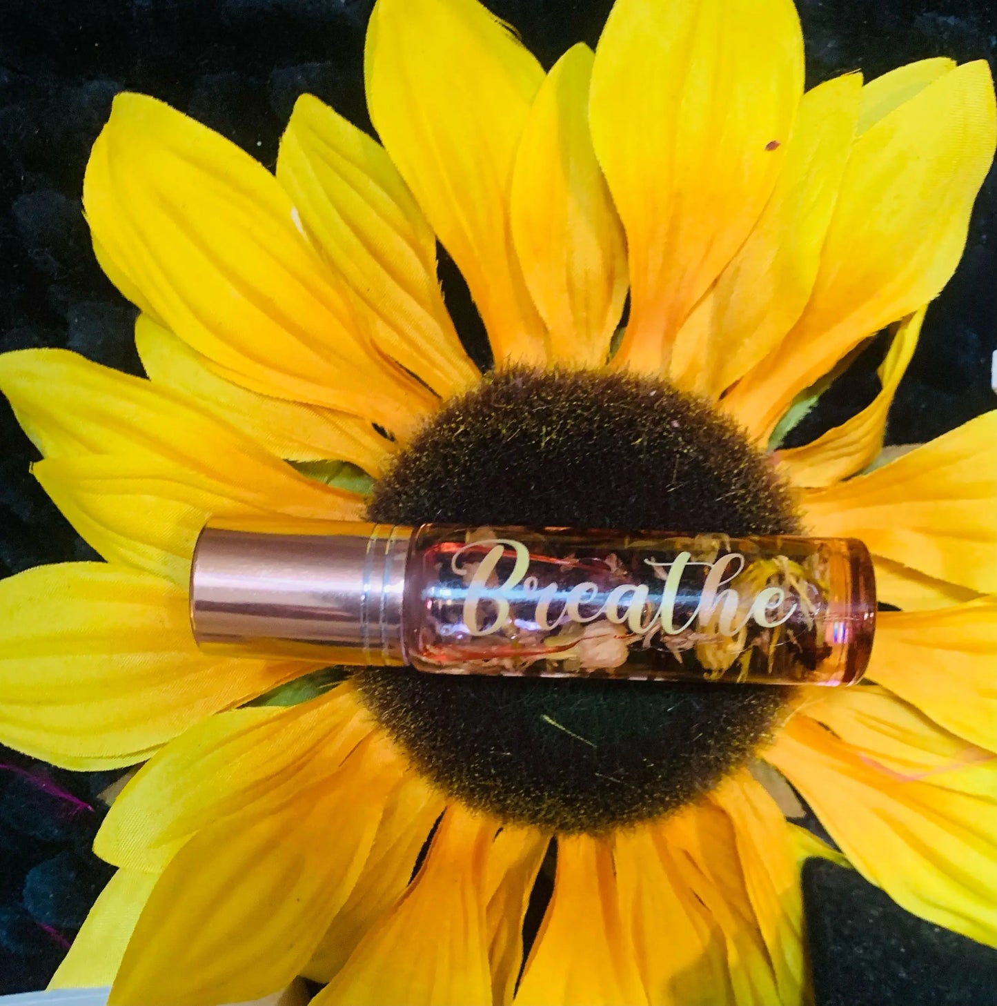 Breathe is an organic essential oil infused with organic holy basil, sandalwood, fresh mint, jasmine, baby breath, rose petals, and more natural herbs to enhance self-love, strength, and happiness. This oil also leaves your skin feeling soft, fragrant, and replenished. This oil is handmade locally by Vibe High Tribe in Los Angeles, CA